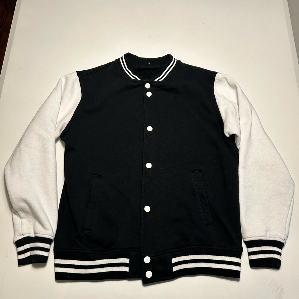 Black and white fleece varsity style jacket